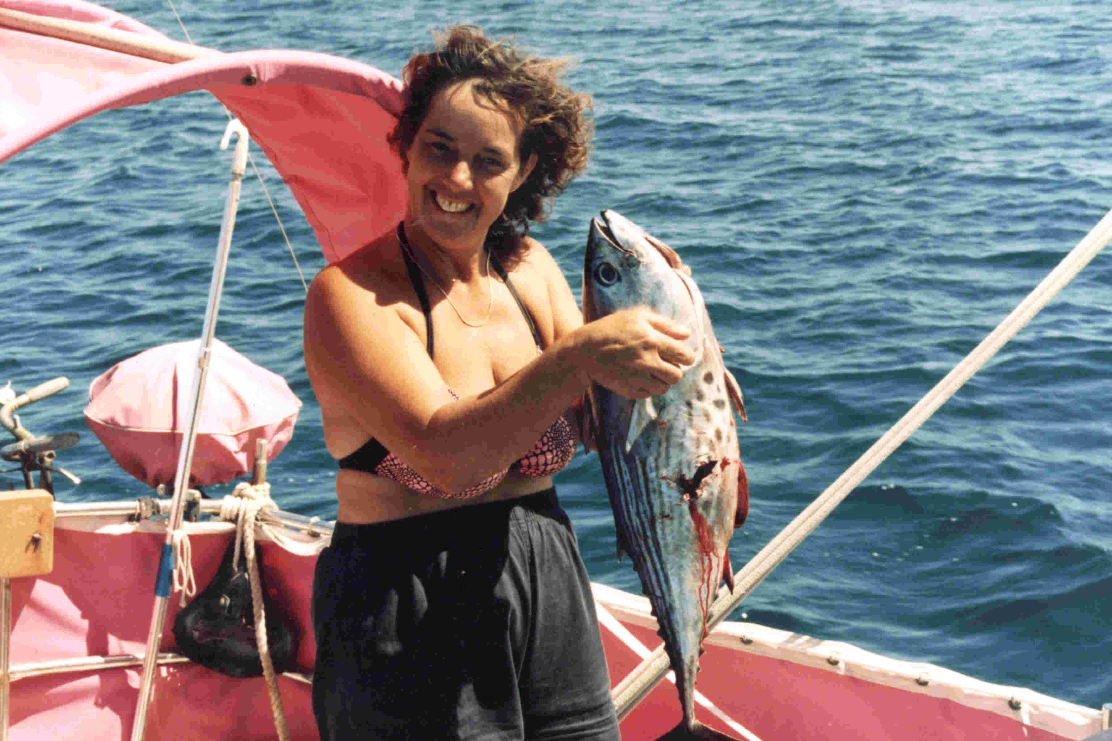 Sandra with breakfast, lunch, and dinner — with the Skipjack she caught on her little pole with chicken gizzards